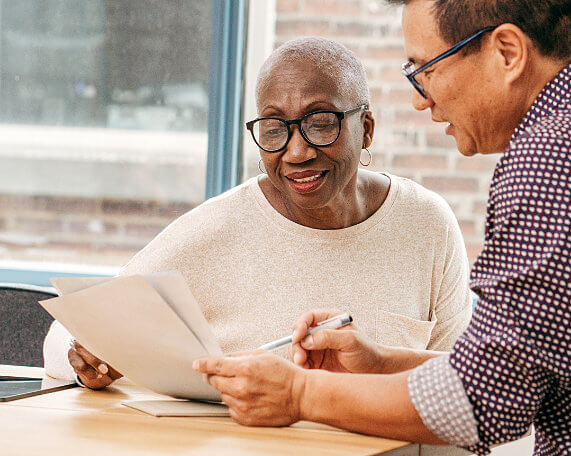Senior woman discussing wealth preservation with an elder law attorney
